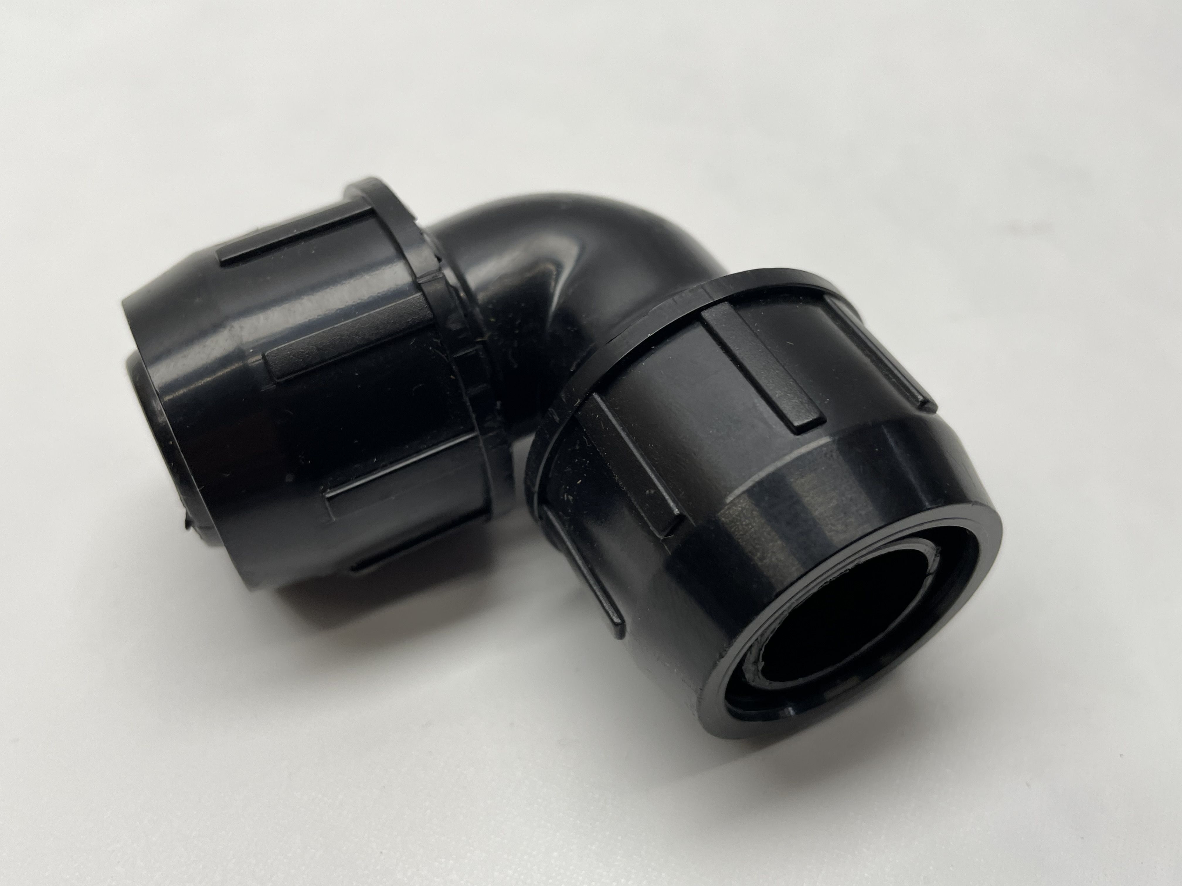 68d3ee66579cce986905964e2b3bd489ea1a4e45 PE-Easy Winkel 25 mm auf 25 mm verschraubt (Box30) grün